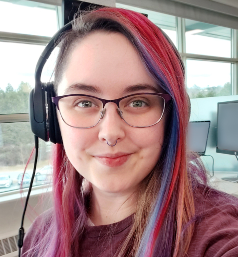 Selfie of Brittany in an office